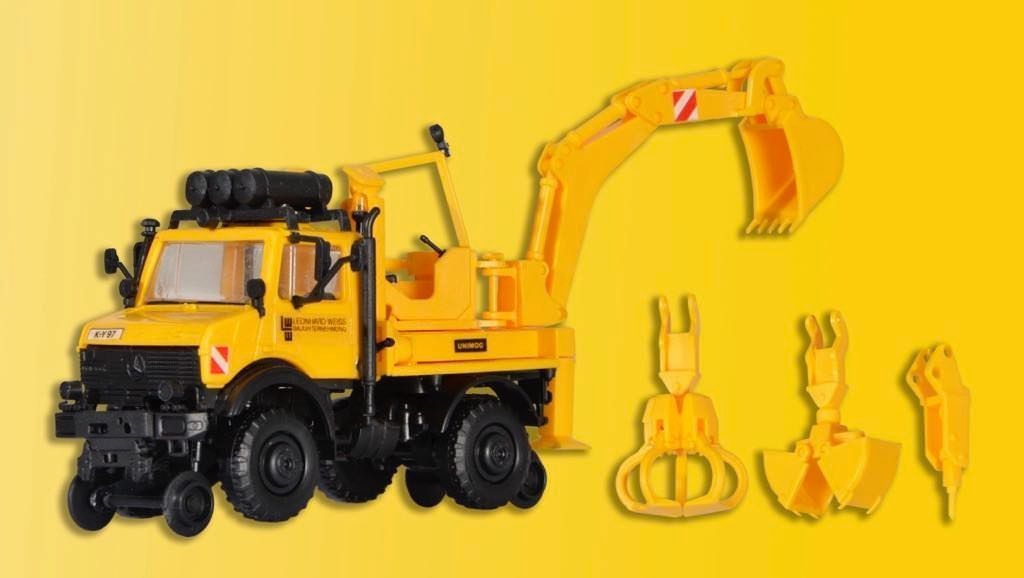 Kibri 16307 - Zweiwege UNIMOG mit Heckbagger H0 1:87