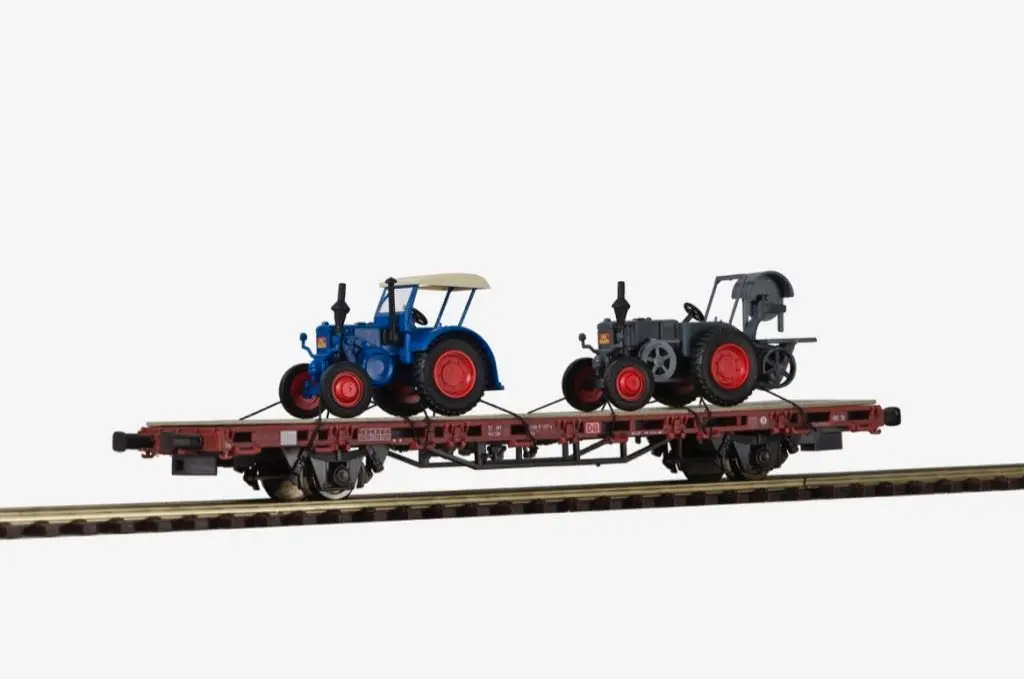 Kibri 26252 - Niederbordwagen mit zwei LANZ Bulldogs Fertigmodell H0/GL