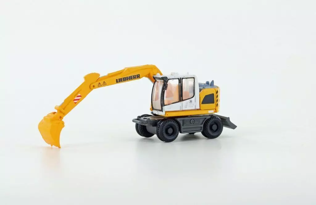 Lemke Minis 4266 - Liebherr Compact Bagger mit Tieflöffel N 1:160