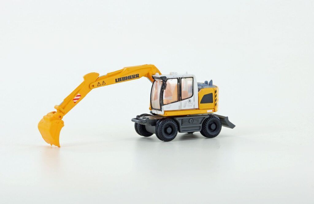 Lemke Minis 4266 - Liebherr Compact Bagger mit Tieflöffel N 1:160