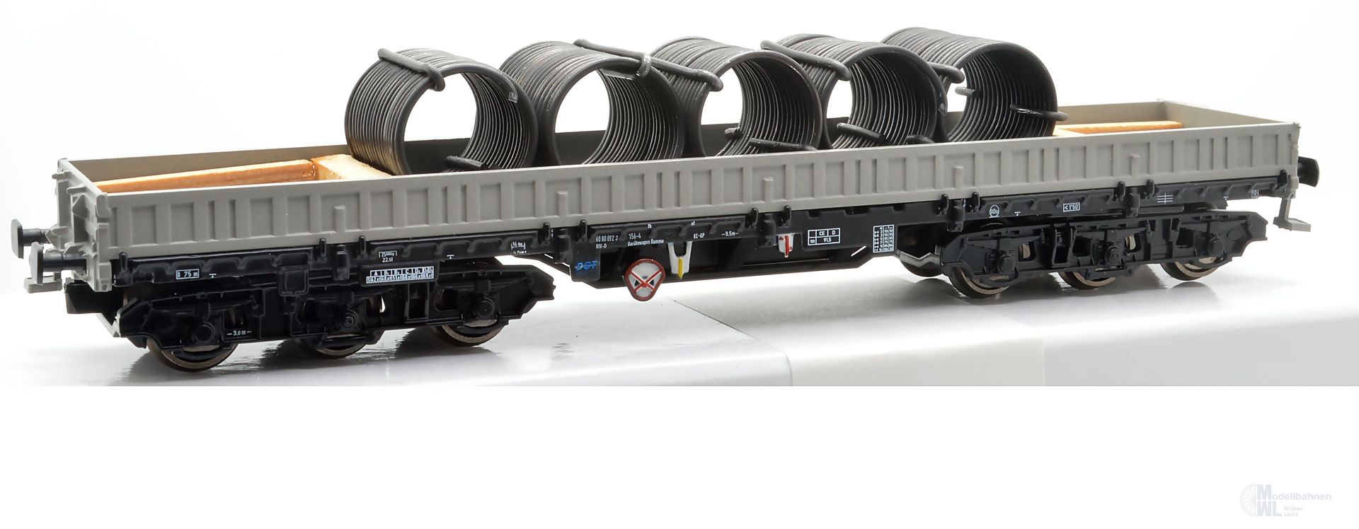 NPE NW22941 - Schwerlastwagen DR Ep.IV Samms 4860 grau beladen mit Drahtrollen H0/GL