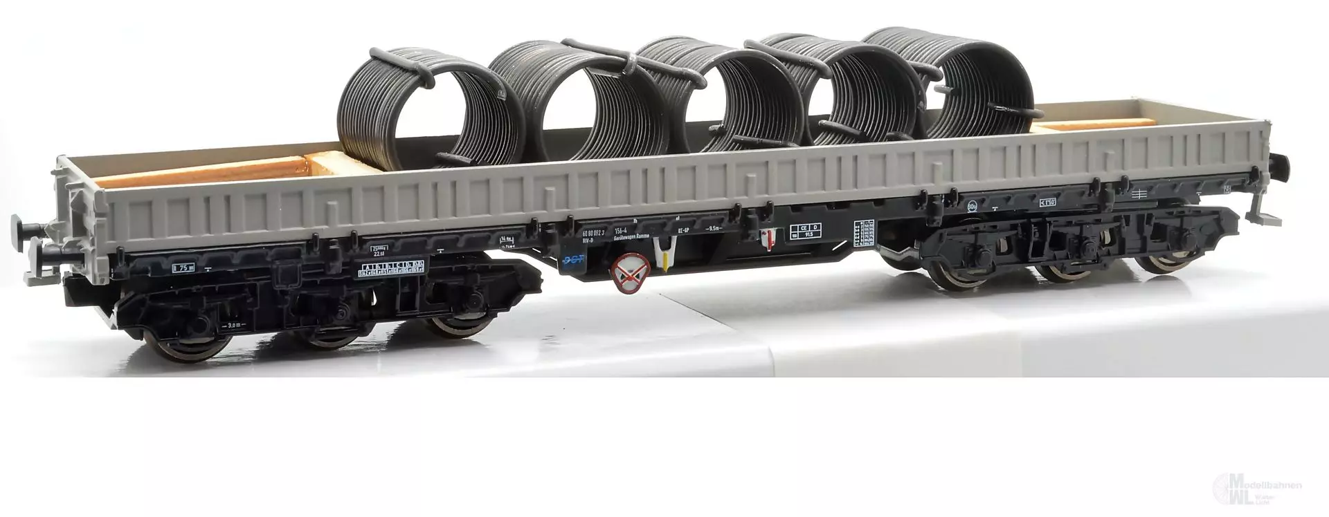 NPE NW22941 - Schwerlastwagen DR Ep.IV Samms 4860 grau beladen mit Drahtrollen H0/GL