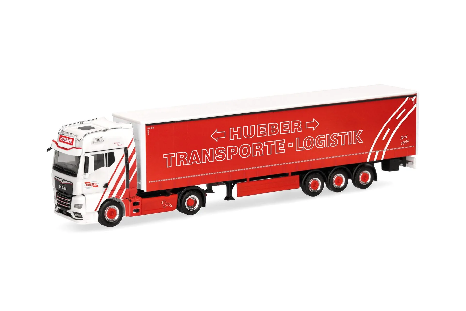 Herpa 321259 - MAN TGX GX Gardinenplanen-Sattelzug Hueber Heideck H0 1:87