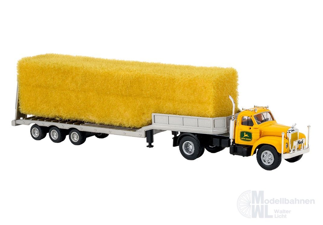 Brekina 85984 - Mack B61 mit beladenem Tieflader gelb H0 1:87