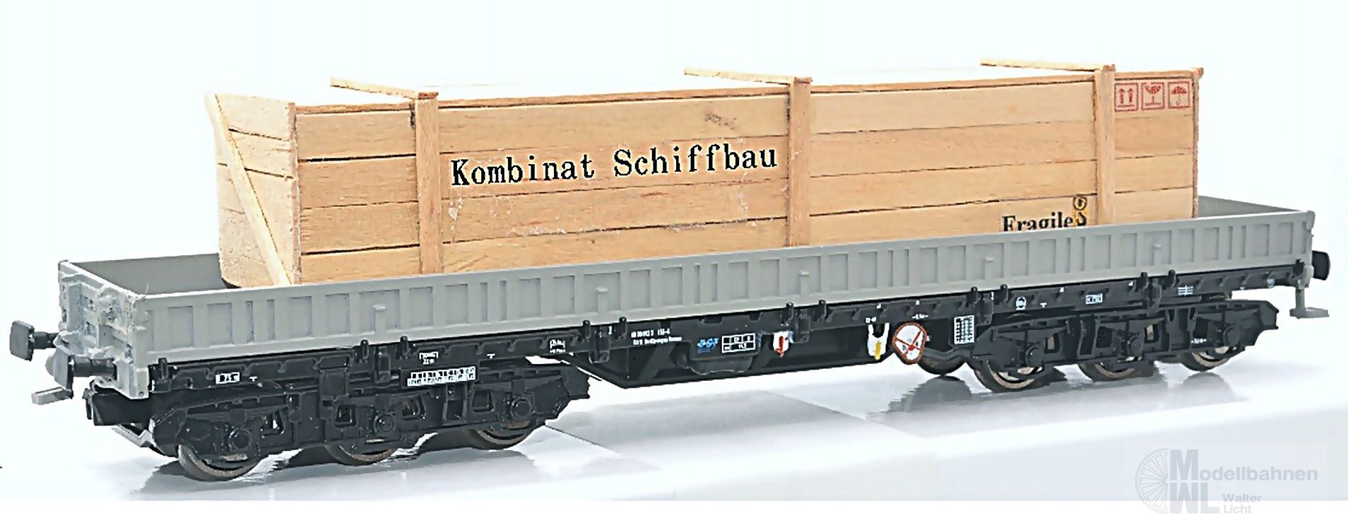 NPE NW22942 - Schwerlastwagen DR Ep:IV Samms 4860 grau beladen mit Kiste Kombinat Schif
