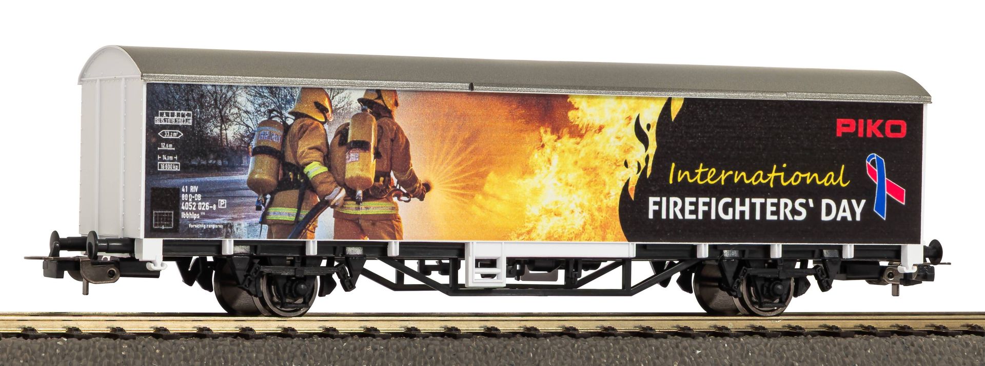 Piko 27902 - Sonderdruckwagen Internationaler Tag der Feuerwehrleute H0/GL