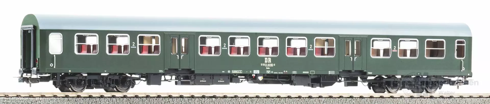 Piko 28000 - Mitteleinstiegswagen DR Ep.IV 2.Kl. Grün / graues Dach H0/GL