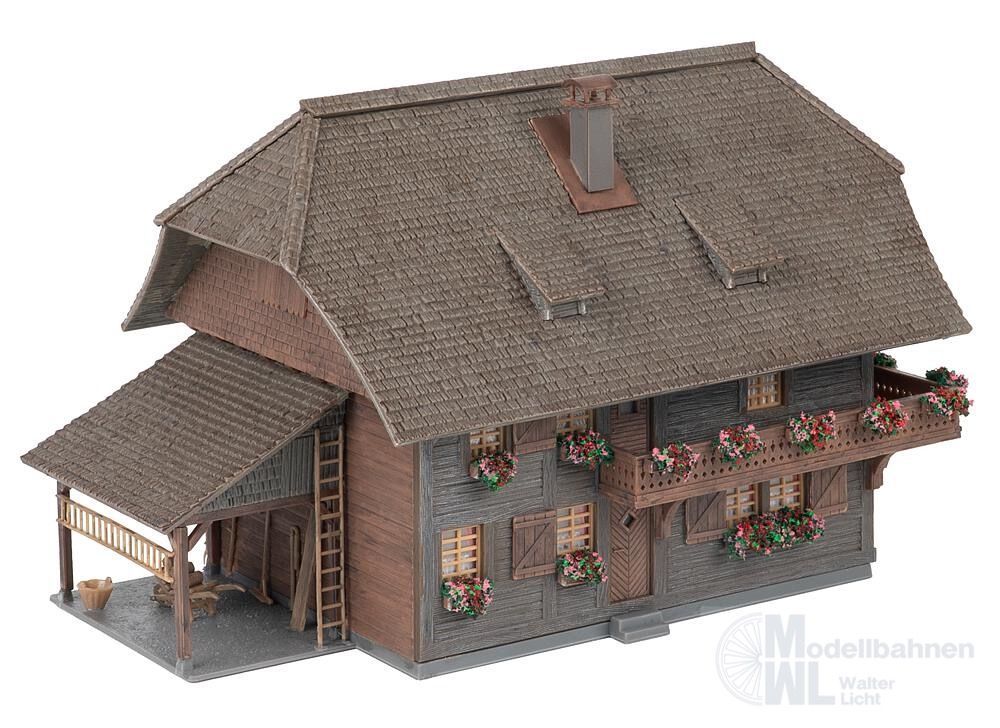 Faller 130012 - Jubiläumsmodell Uhrenmacherhaus mit Figur H0 1:87